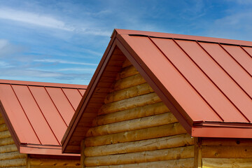 Two shack with red roofs