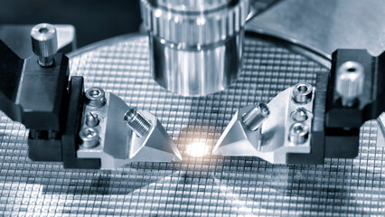 Machine checking silicon wafers in clean room laboratory, close up. Silicon Wafers and Microcircuits with Automation system control application on automate robot arm