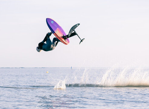 Neusiedl, Austria: backflip on a hydrofoil windsurf board