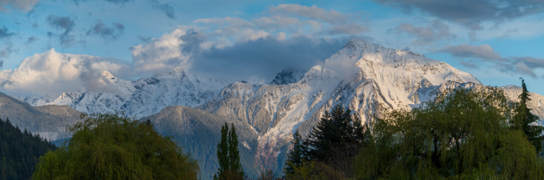 The Mount Cheam Range above the Harrison Hot Springs Resort during sunset. The Cheam Range is a mountain range in the Fraser Valley region of the Lower Mainland of British Columbia.