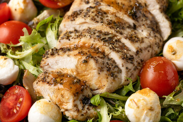 Chicken caprese salad with tomato, mozzarella and balsamic dressing
