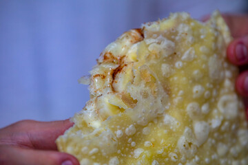 Traditional heart of palm fair pastry highlighted