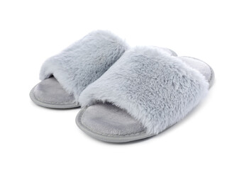 Pair of soft slippers with fur isolated on white
