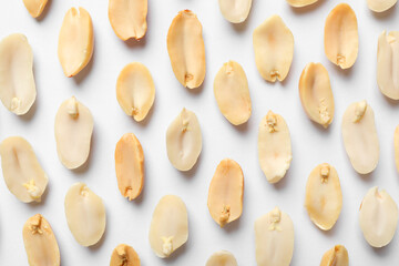 Fresh peanuts on white background, flat lay