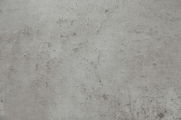 Grey concrete textured surface as background, closeup