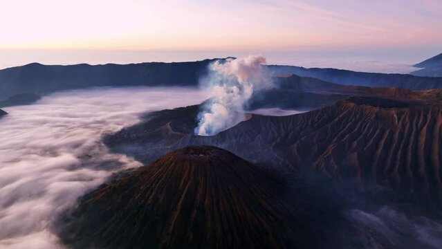 Mount Bromo volcano during sunrise or sunset sky over Mountains Penanjakan in Bromo Tengger Semeru National Park,East Java,Indonesia.Landscape background