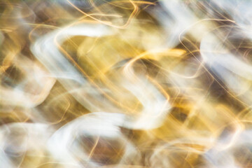fondo detellos de luz en movimiento de color dorado y blanco, color dorado, 