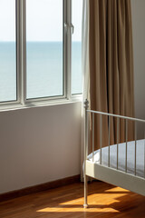 Close up morning sun light beam on bed. Seaside resort holiday feel. Natural light. Concept of...
