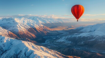 Hot air balloon floating over snow mountain with copy space area.