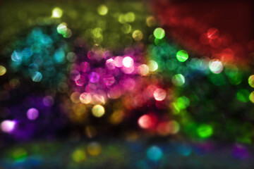 Dreamy golden bokeh and flare background, multicolored lights in the night. Peaceful or festive...