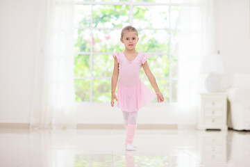 Fototapeta na wymiar Baby ballet. Little ballerina girl in dance class.