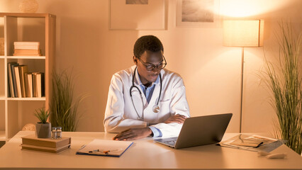 Telemedicine chat. Doctor online. Digital clinic. Male physician in white coat consulting patient...