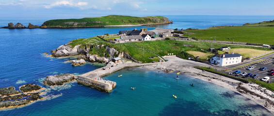 Aerial view of visitors having fun at Portmuck Harbour Islandmagee Co Antrim Northern Ireland