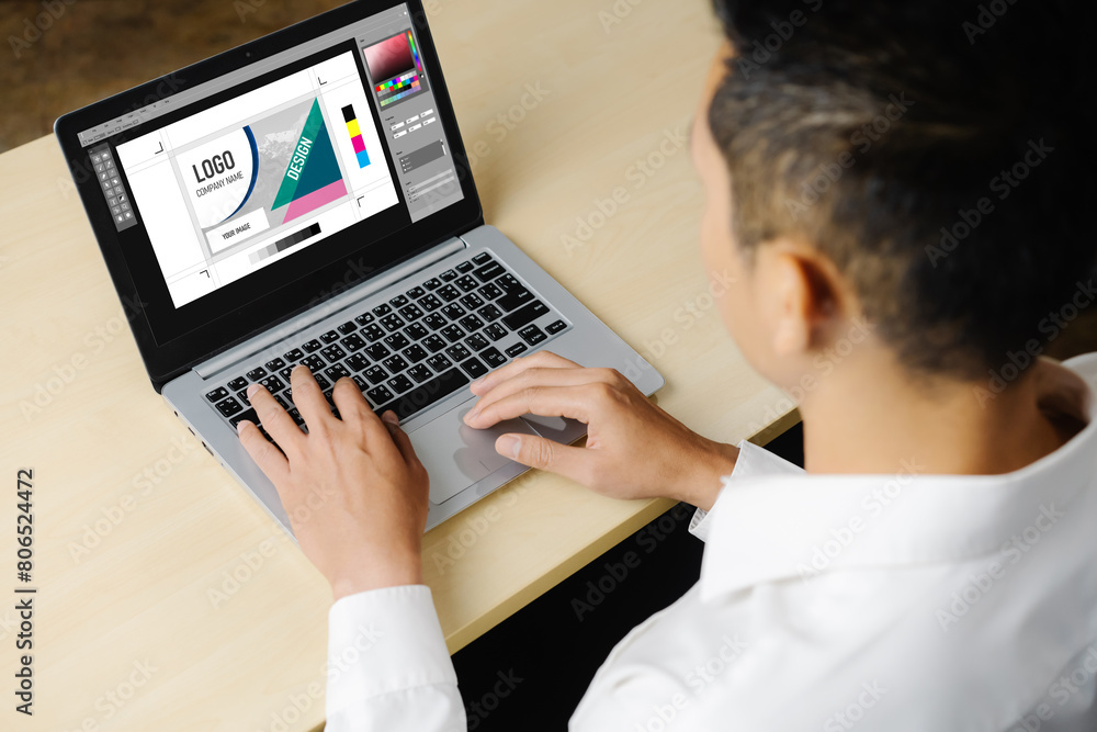 Poster graphic designer software for modern design of web page and commercial ads showing on the computer s