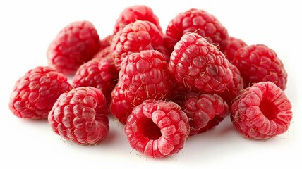 Fresh raspberries with fine hairs and deep red color, isolated on white for a striking image