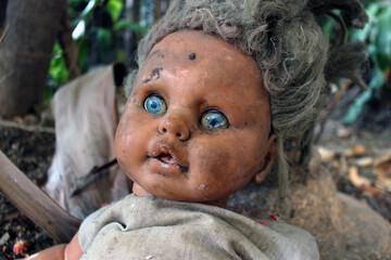 Scary horror doll Creepy doll Halloween concept, Close up of Ghost doll mystic in abandoned places background