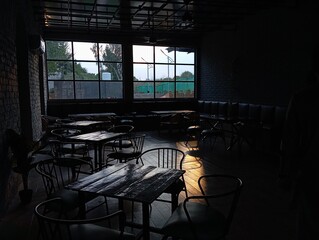 Café Interior with ambient dinning chairs and tables 