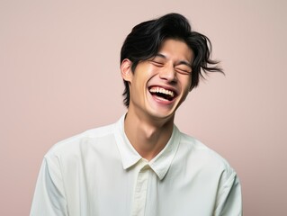 Obraz premium A man with is smiling and laughing