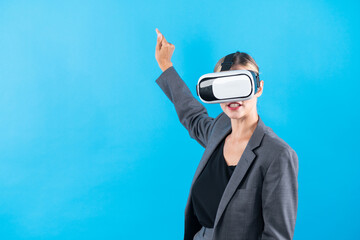 Smart business woman pointing to present idea while using VR goggles. Project manager wearing...