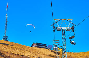 Enjoy the ride on Cimetta Mount chairlift, Ticino, Switzerland