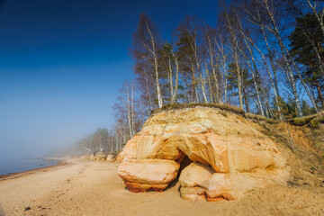 Veczemju Klintis, Veczemju Cliffs on Baltic Sea Near Tuja, Latvia. Beautiful Sea Shore With Limestone and Sand Caves