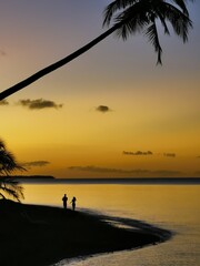 A couple on the sunset on the beach