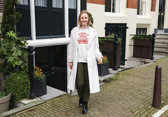 Mockup of woman wearing customized top and jacket