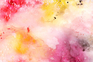 Abstract art with pink, red and yellow watercolour splashes and dots for creative background or wallpaper macro