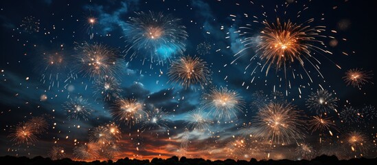 Colorful fireworks with beautiful sky background at New Year and copy space