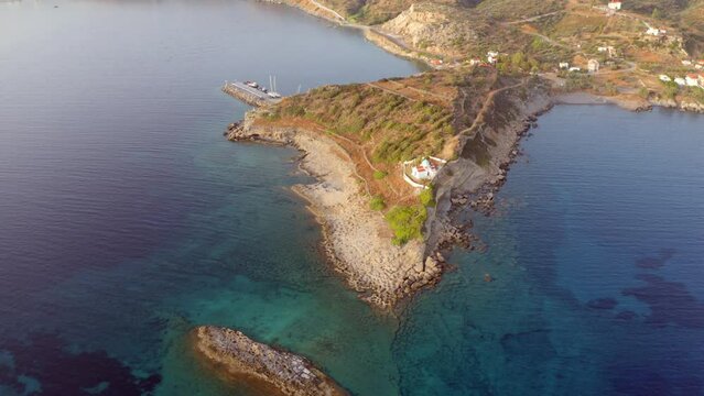 4k drone forward video (Ultra High Definition) of Agia Paraskevi Church. Marvelous evening scene of Peloponnese peninsula, Greece, Europe. Spectacular summer seascape of Ionian sea. Travel the world.