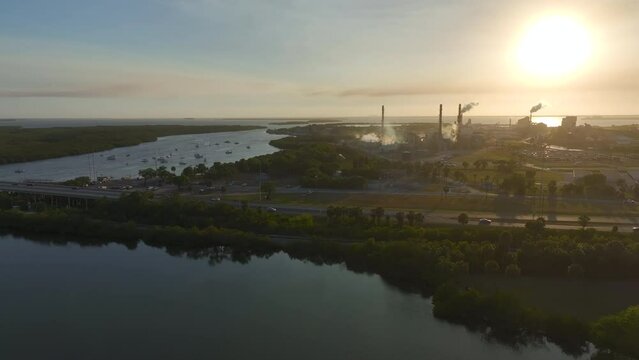 Industrial facility for chemical production of phosphoric acid polluting atmosphere with toxic emissions. Mosaic Riverview Plant in Tampa, Florida. Factory for handling and processing of phosphates