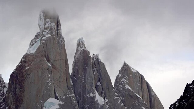 Timelapse of cerro torre, egger and standhardt. Close up view with fast moving clouds in extreme conditions. Patagonia,Argentina