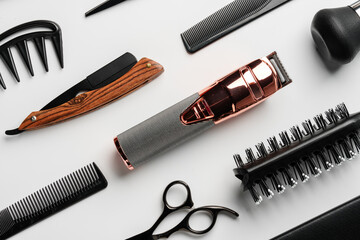 Pattern of various shaving and bauty care accessories for men on gray background