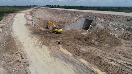 excavator on the road