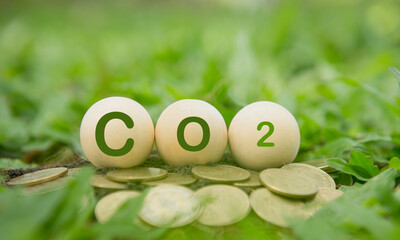 Invest co2, the concept of reducing carbon dioxide emissions by using clean energy and mitigating...