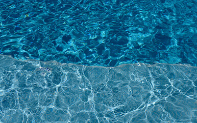 blue water background swimming pool