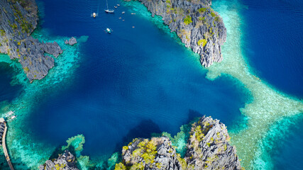 Aerail view with Coron, Palawan, Philippines of a beautiful lagoons and limestone cliffs.