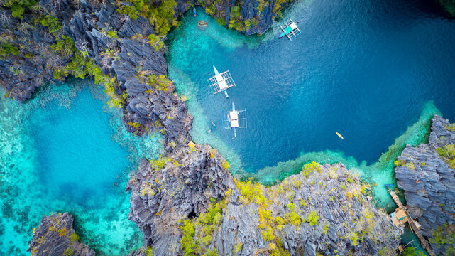 Aerail view with Coron, Palawan, Philippines of a beautiful lagoons and limestone cliffs.