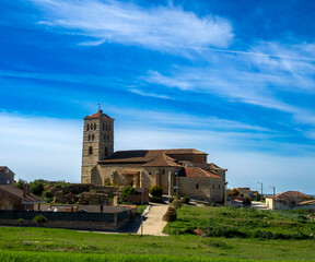 Church of Santa Maria del Castillo with its wonderful late Romanesque bell tower. Torremormojon, Palencia, Spain.