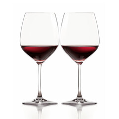 A couple red wine glasses isolated on white background. Rose wine splashing in glassware.