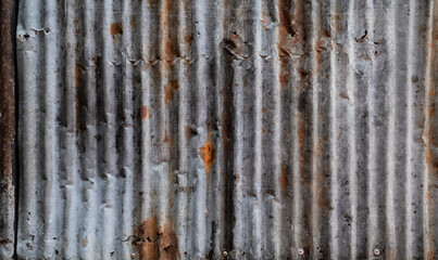 Old zinc surface background The rust on the surface of zinc. Which is taken from the fence next to...