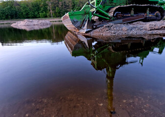 mining of sand sedimenting in river bed. for navigation, bottom must be kept free of deposits. ...