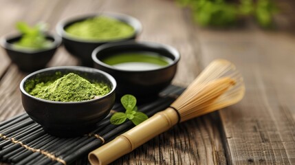 There are three bowls on a wooden table. Two are filled with matcha powder and one is filled with a...