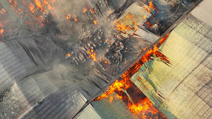 Amidst the wreckage of the industrial complex, fire reigns supreme. Collapsed roofs and fierce...