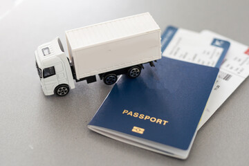 Big White toy truck over Tickets on a white background. 3d Rendering