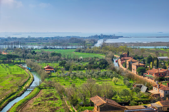 Italy, Veneto, Torcello, Aerial view of Venetian Lagoon in spring