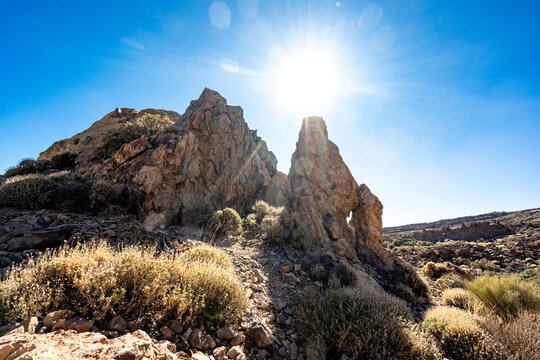 Spain, Canary Islands, Sun shining over Roques de Garcia in El Teide National Park