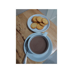 cup of coffee and cookies
