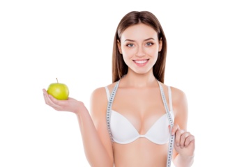 Natural beauty concept. Portrait of joyful satisfied beautiful attractive charming woman showing green apple in palm and holding tape-measure on shoulders isolated on white background