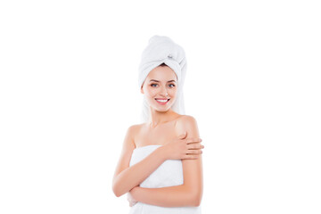Portrait with copy space of pretty brunette girl with towel on head after shower touching enjoying soft skin looking at camera isolated over white background